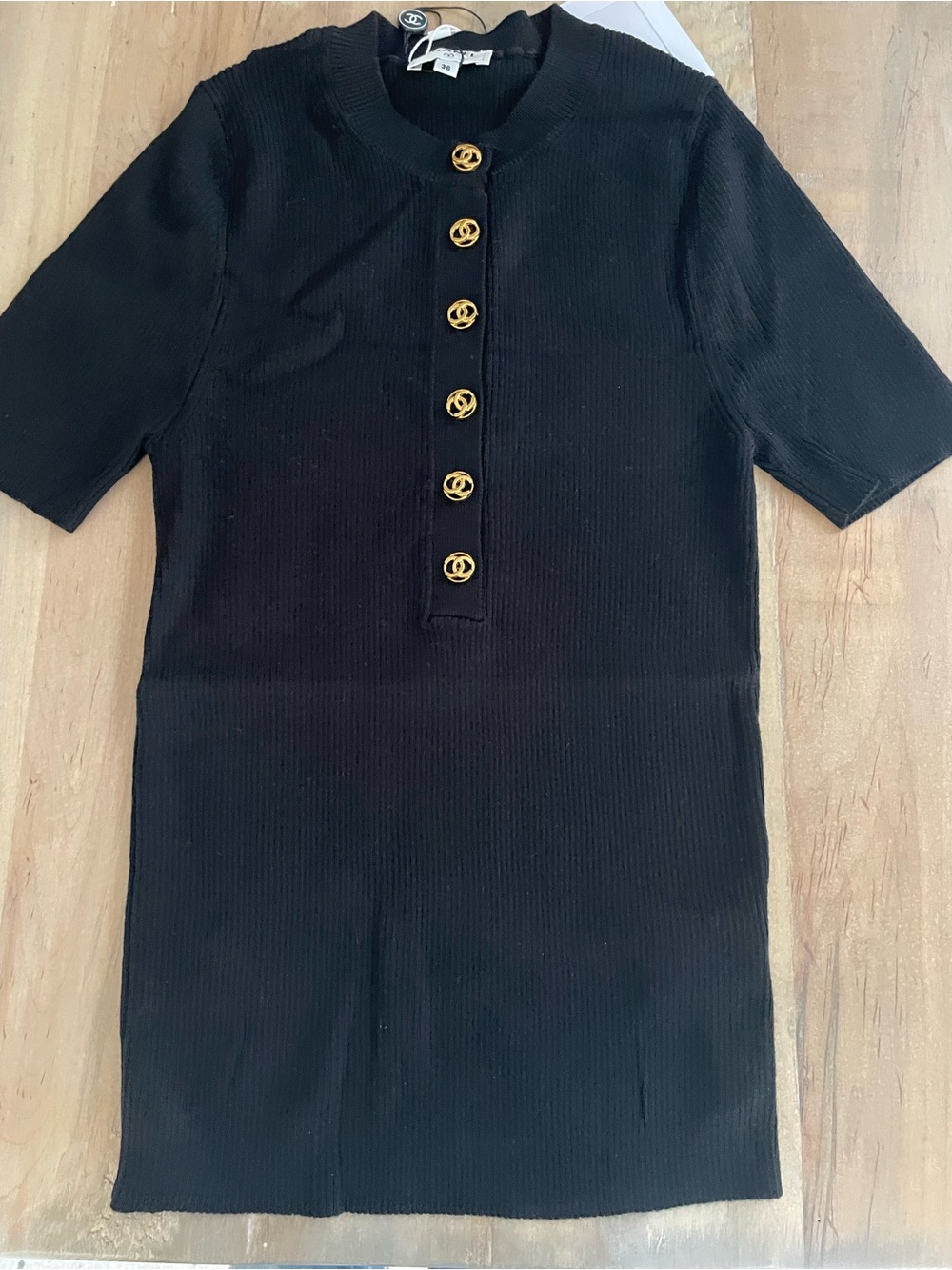 CHANEL Black Ribbed Short-Sleeve Knit Top with Gold CC Buttons